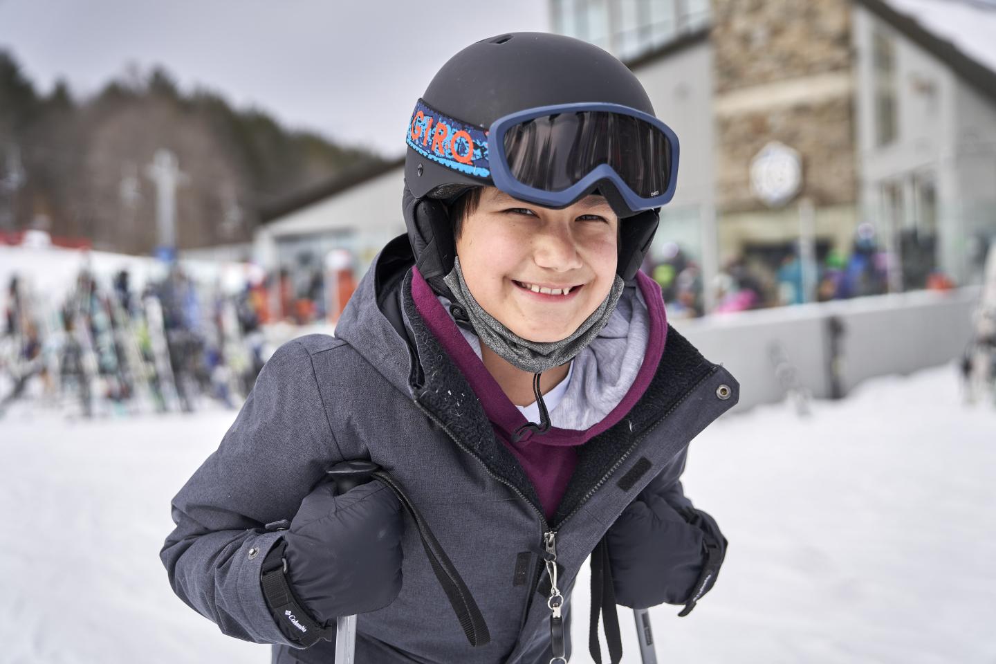 Smiling Kid on skis